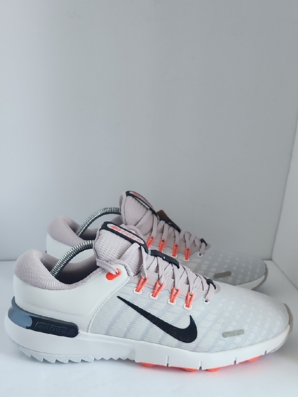 Nike Free Golf NN White Sneakers with Coral Accents and Black Swoosh